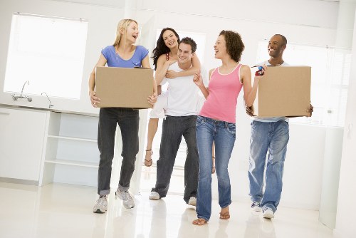 Professional packing team preparing boxes for a Kidbrooke home move