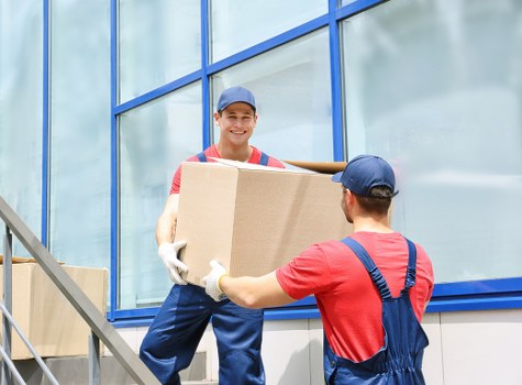 Moving boxes and furniture prepared for a Kidbrooke home removal