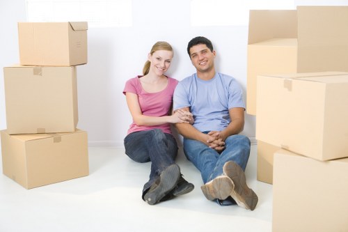 Packed moving boxes and furniture ready for collection