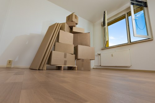A local moving van working near Kidbrooke residential apartments