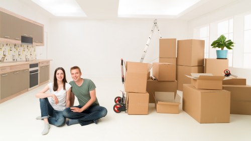 Local removals team handling furniture in Kidbrooke