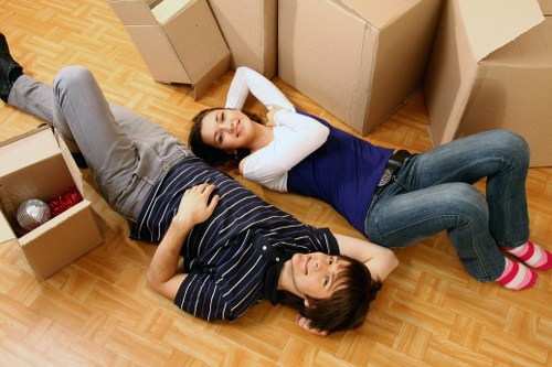 Packed boxes and furniture ready for local removal service
